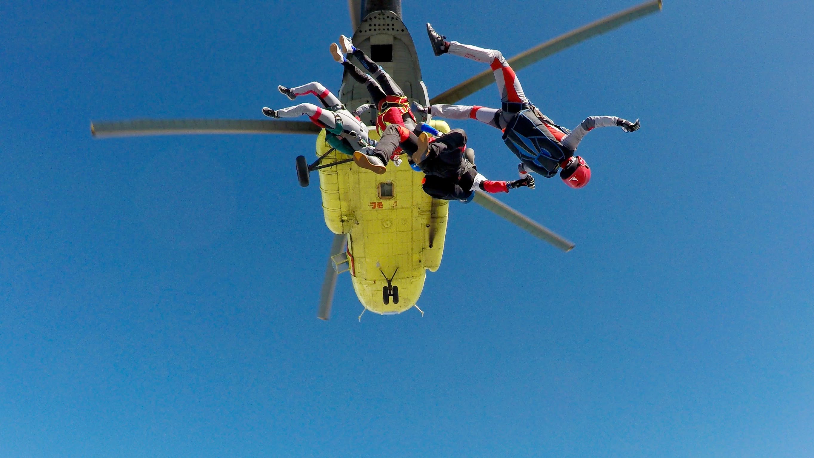 3 people skydiving