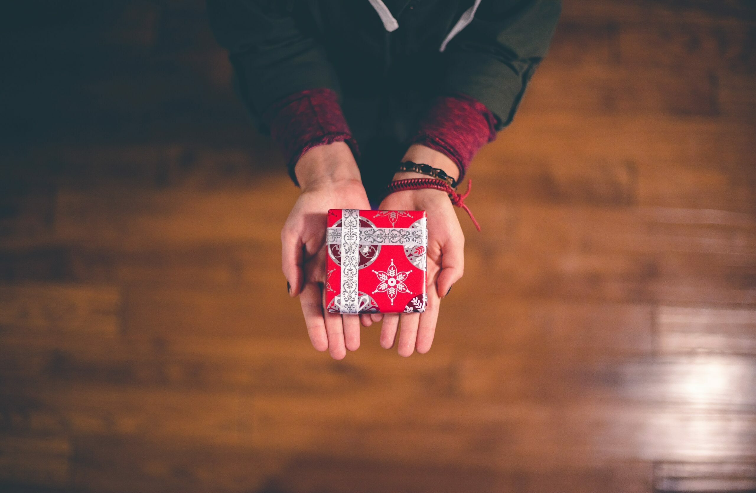 A person holding a gift