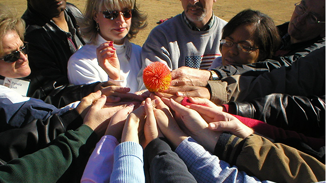 group engaged in team building activity